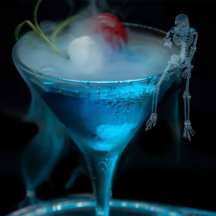 PALE BLUE EYE - A refreshing light blue cocktail made with blueberry vodka, fresh lemon juice, rose syrup and topped with La Croix.